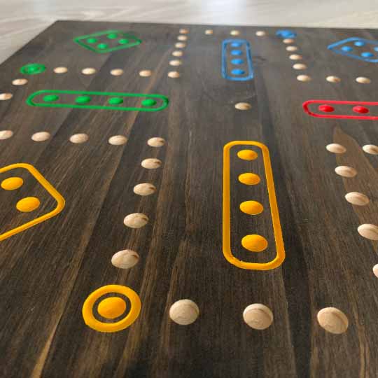 4 player wooden aggravation board game with marbles and dice
