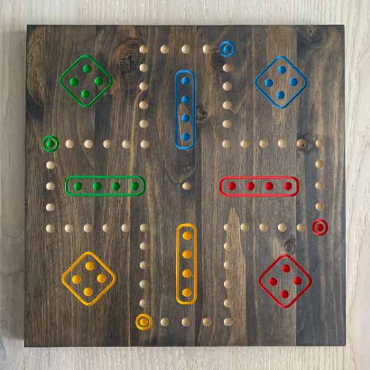 4 player wooden aggravation board game with marbles and dice