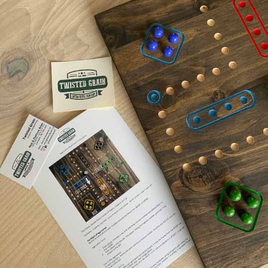 4 player wooden aggravation board game with marbles and dice and rules