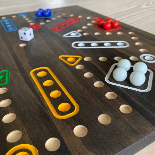 Double-Sided Wooden Aggravation board game with Marbles and Dice.  Both 6 and 4 player versions on one board